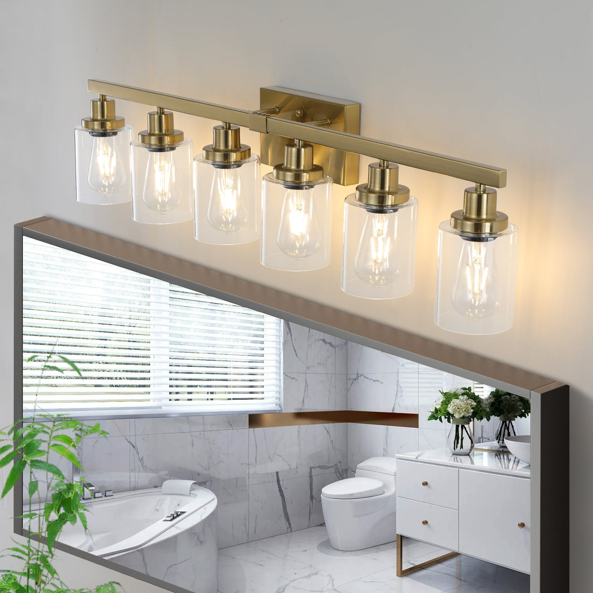 Wide 36.8-inch gold bathroom vanity light mounted above mirror