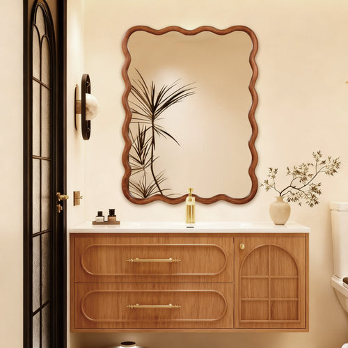 30x40 wavy solid wood bathroom mirror in a styled vanity setting