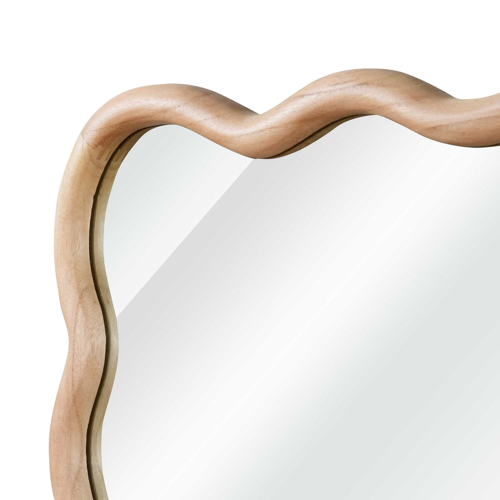 30x40 wavy solid wood bathroom mirror in a styled vanity setting